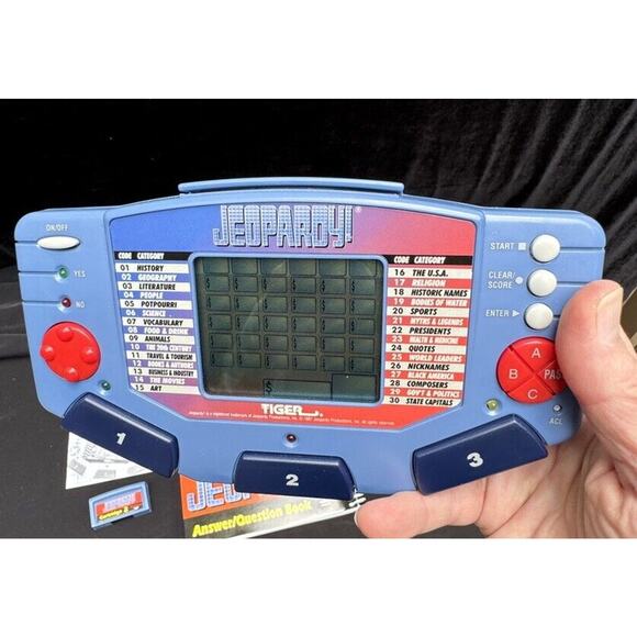 1995 Jeopardy Handheld Game Tiger Electronics Tested 2 Cartridge & Books -A75 - Picture 5 of 9